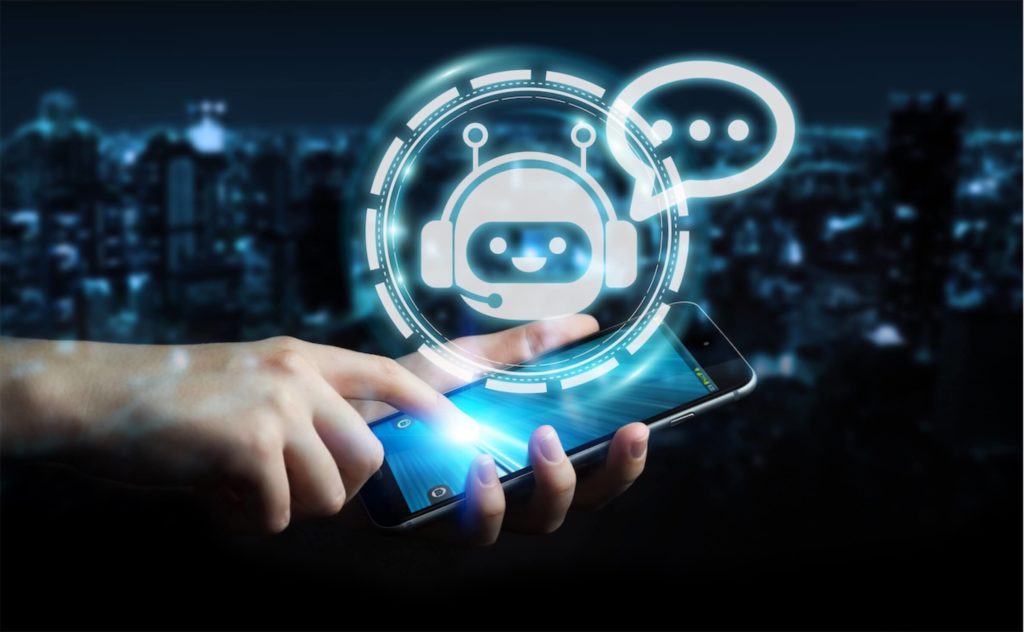 A hand and smartphone against a graphic of a chatbot, a rising trend in digital marketing any content marketing agency in Singapore would be aware of