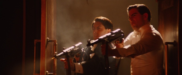 Two characters in Inglourious Basterds firing machine guns in a theatre
